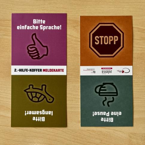 Zwei Bedürfnismelderkarten