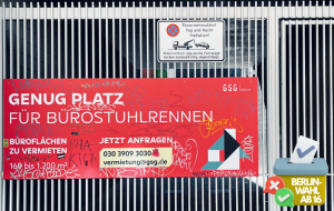 Werbeschild für Büroflächen, Aufschrift: "Genug Platz für Bürostuhlrennen"